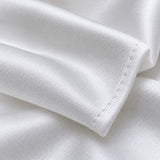 A macro view shows the fine woven texture and clean finished edge of the white polyester pocket square.
