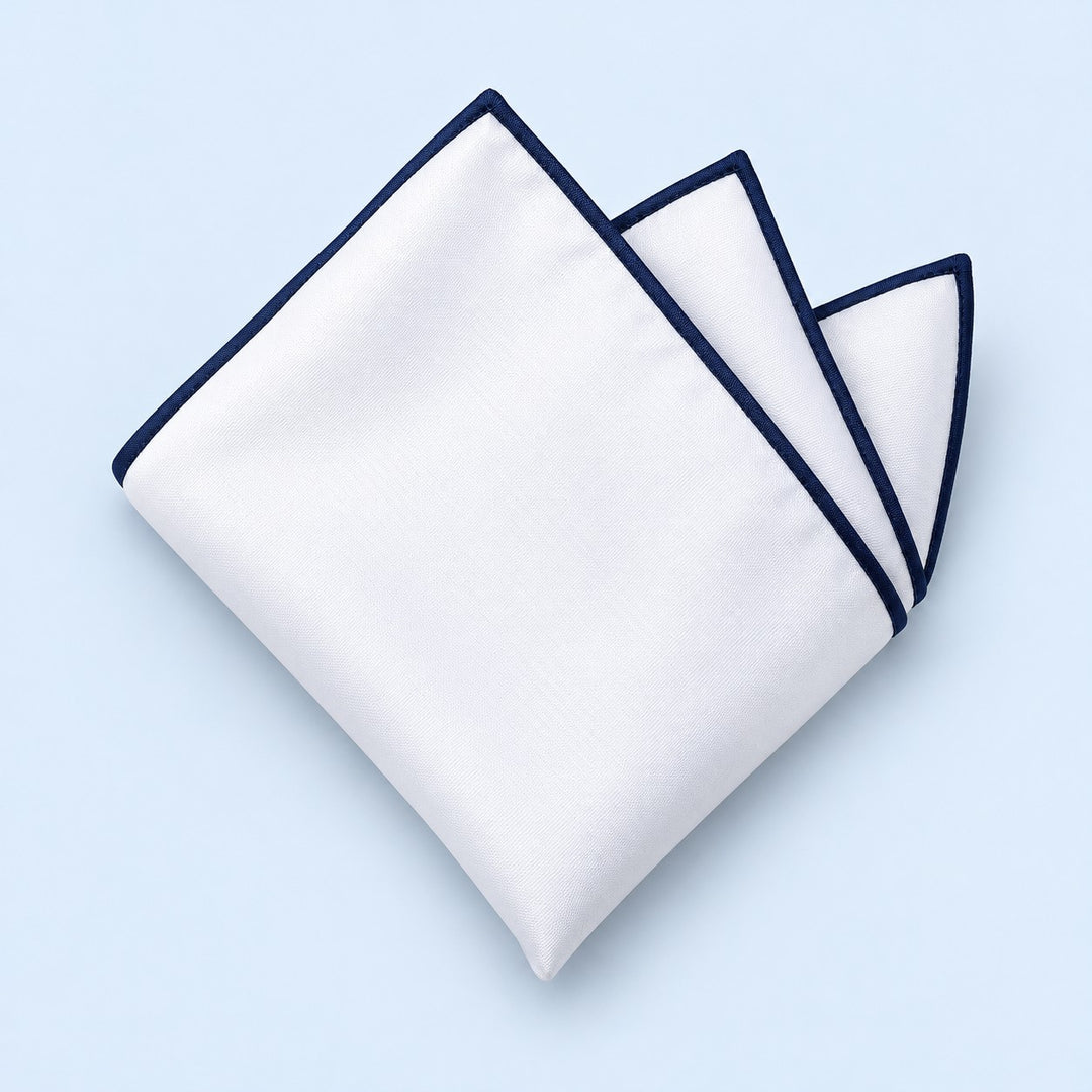 One white polyester pocket square with a navy border is folded on a pale blue background.