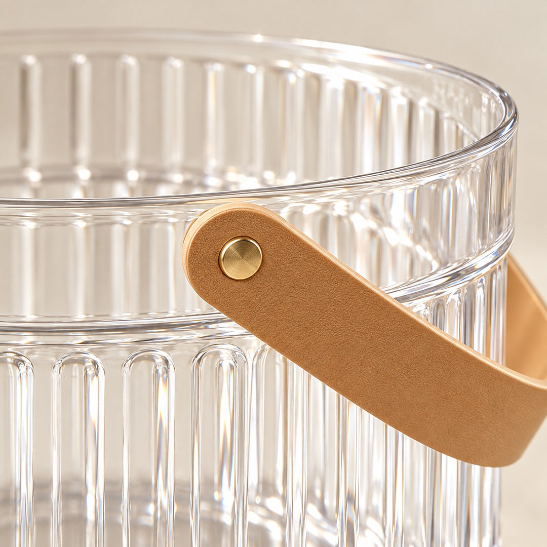 Clear Ice Bucket with Handle close-up reveals glossy fluting and faux leather strap.