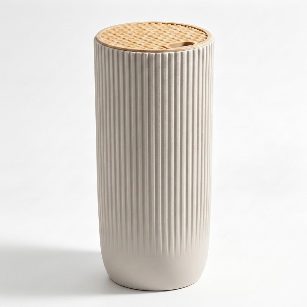 A modern cylindrical pedestal table or planter with a fluted beige ceramic body and a natural woven rattan top, shown on a clean white background.