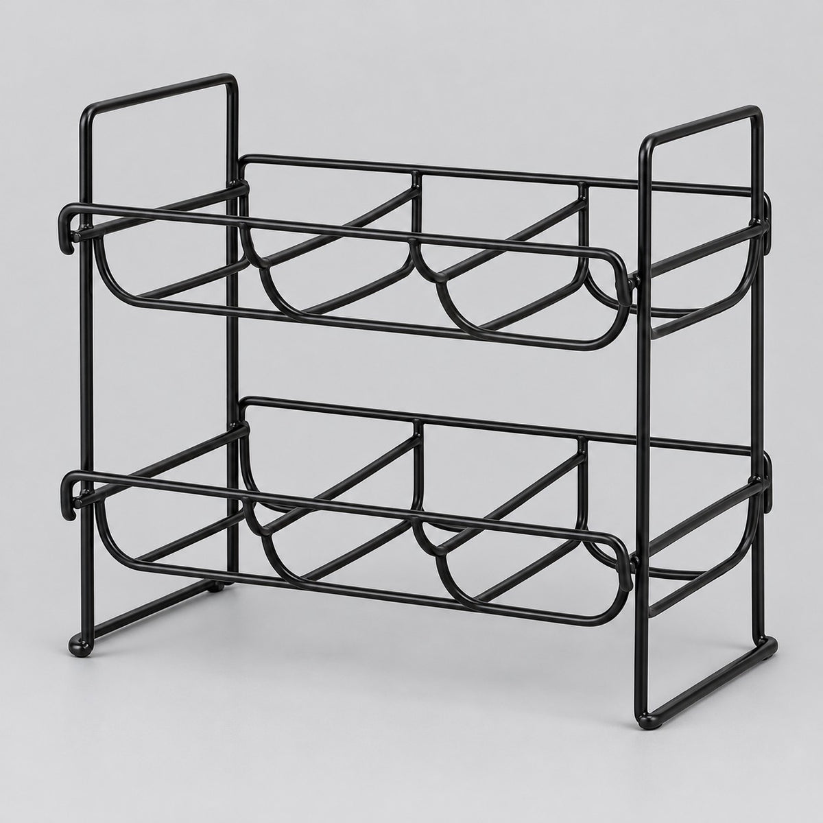 Black two-tier water bottle organizer stands alone against a pale gray studio background.