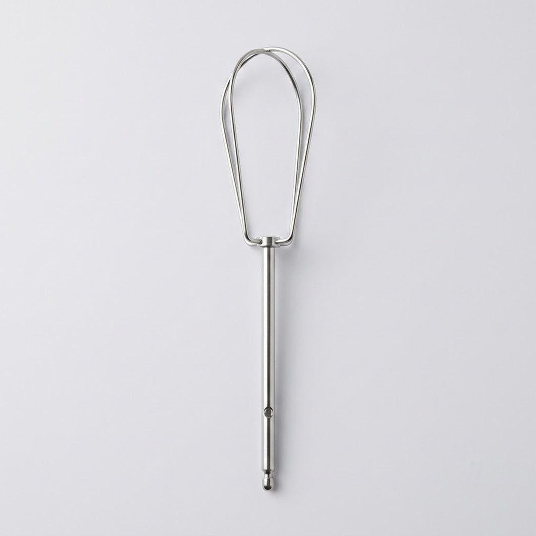 A stainless steel kitchen utensil with a long straight handle and a looped head, shown vertically against a light gray background.