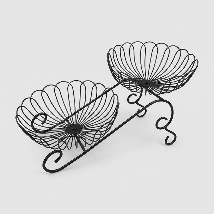 Black metal wire double-tier bowl stand on a light gray background.