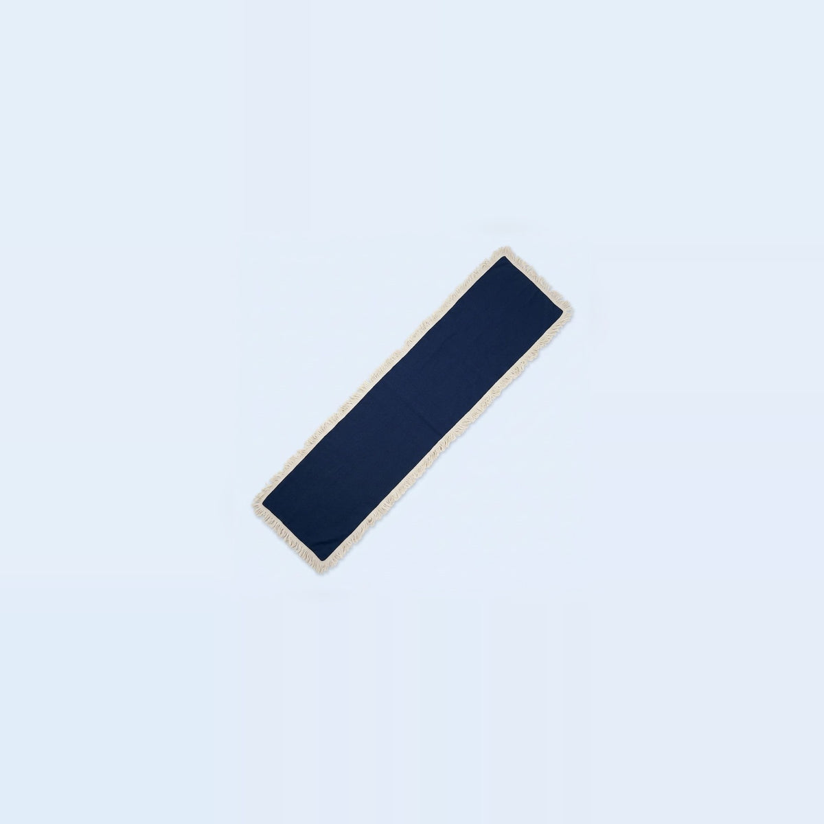 A long, narrow rectangular navy blue fabric accessory with a light beige or cream border, shown diagonally on a very pale blue background.