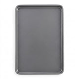 A dark gray rectangular baking sheet with raised rounded corners, shown from a top-down perspective on a clean white background.