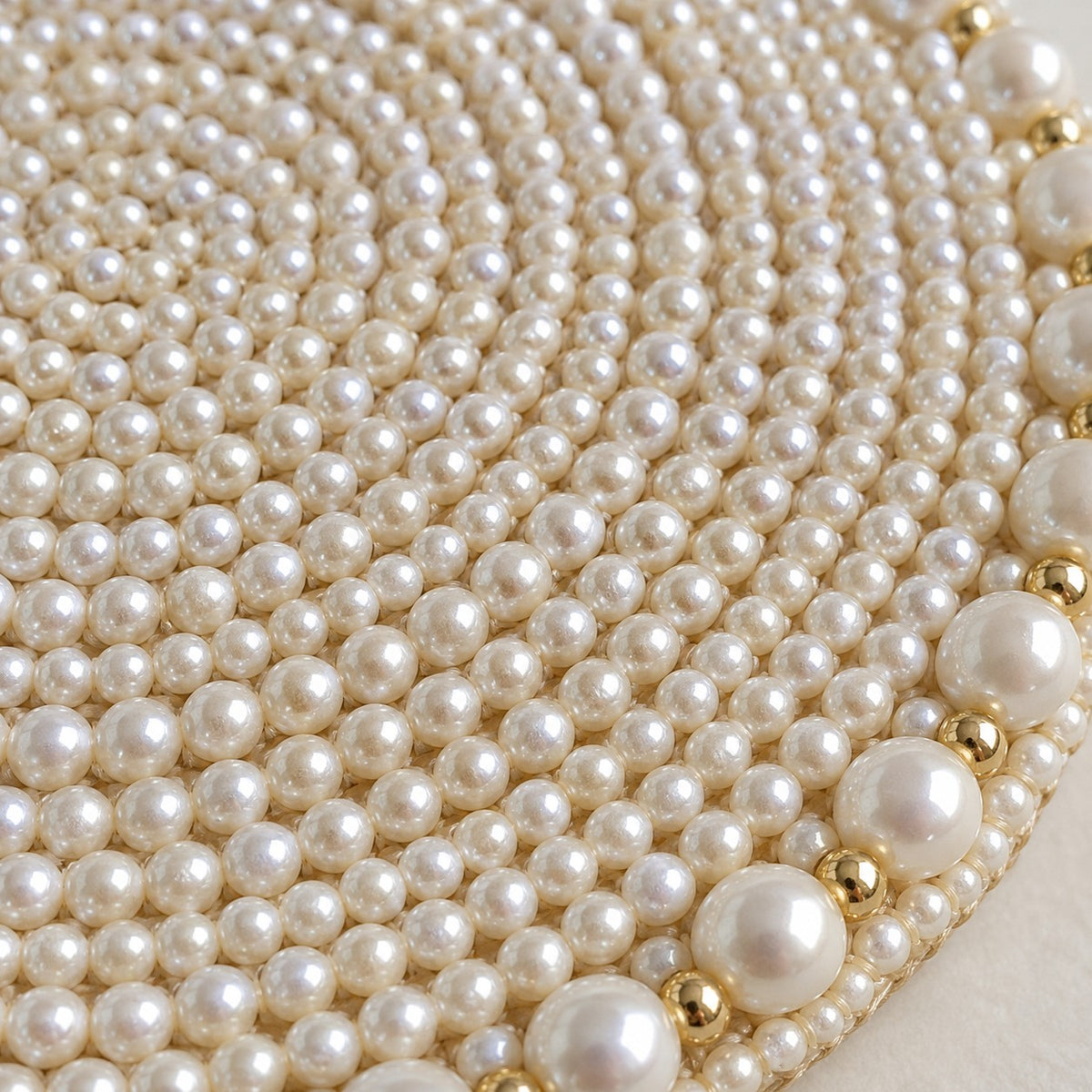 Close-up of the White Pearl Beaded Coaster shows tiny glossy beads and pearl edging.