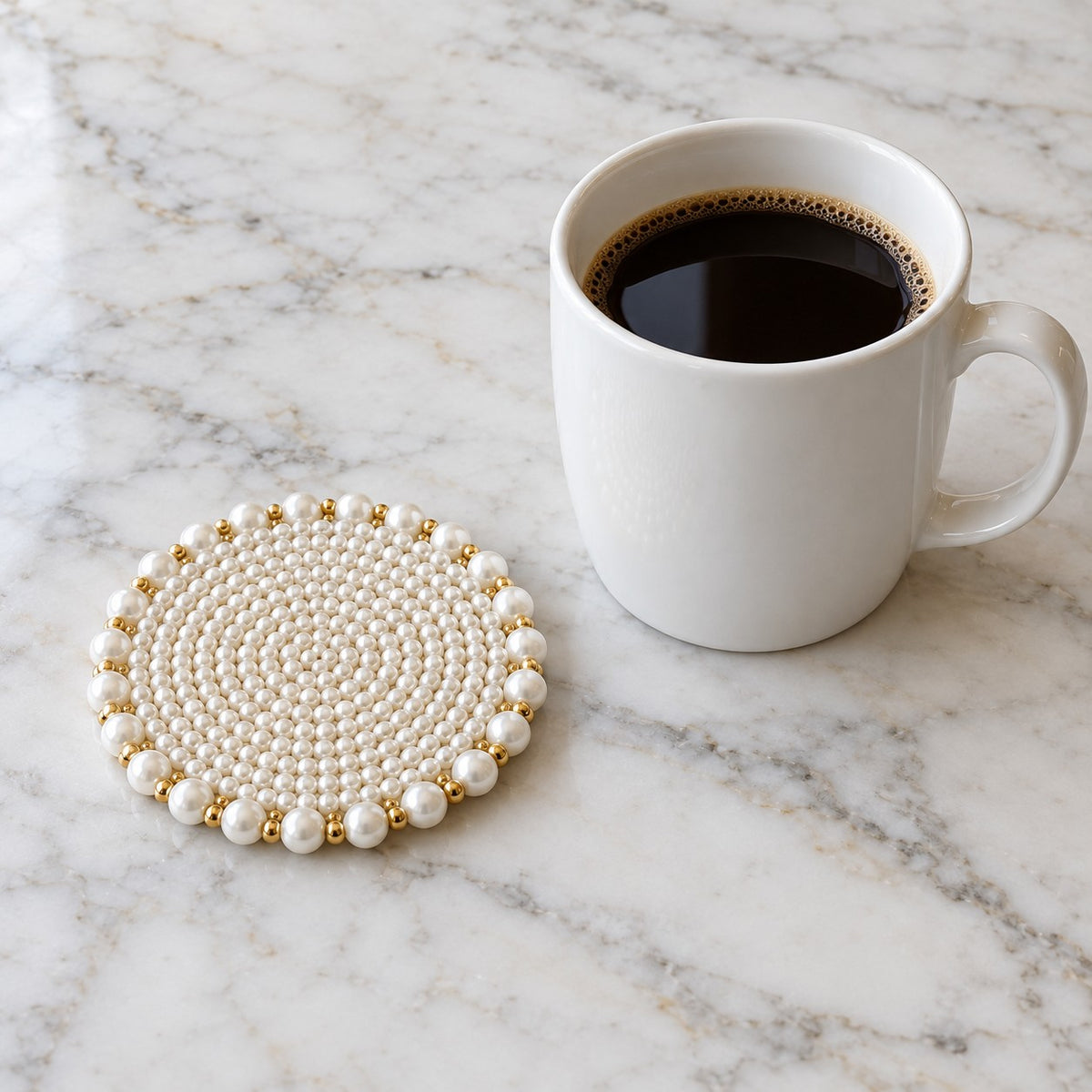 White Pearl Beaded Coaster beside a ceramic mug shows its compact size.
