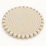 White Pearl Beaded Coaster centered on a pale ivory studio backdrop.