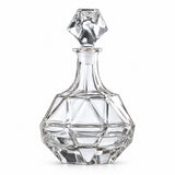 One empty Diamond Square glass whiskey decanter with its square stopper stands on white.