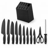 The 15-piece black kitchen knife set is laid out on white with its block, knives, scissors, and steel.