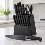 The matte black knife set stores its matching knives and accessories together in a countertop block.