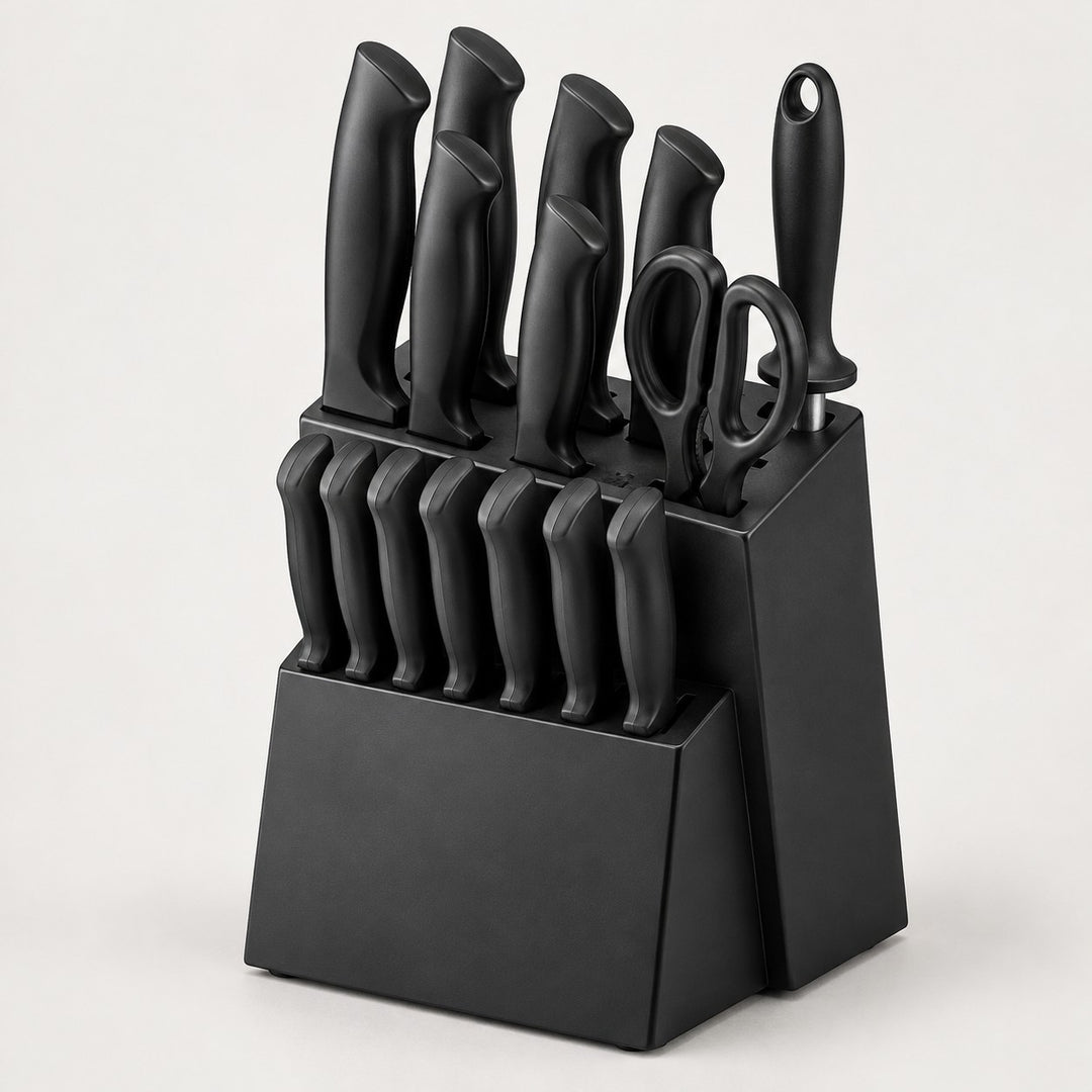 The complete black 15-piece kitchen knife set is centered on a light studio background.