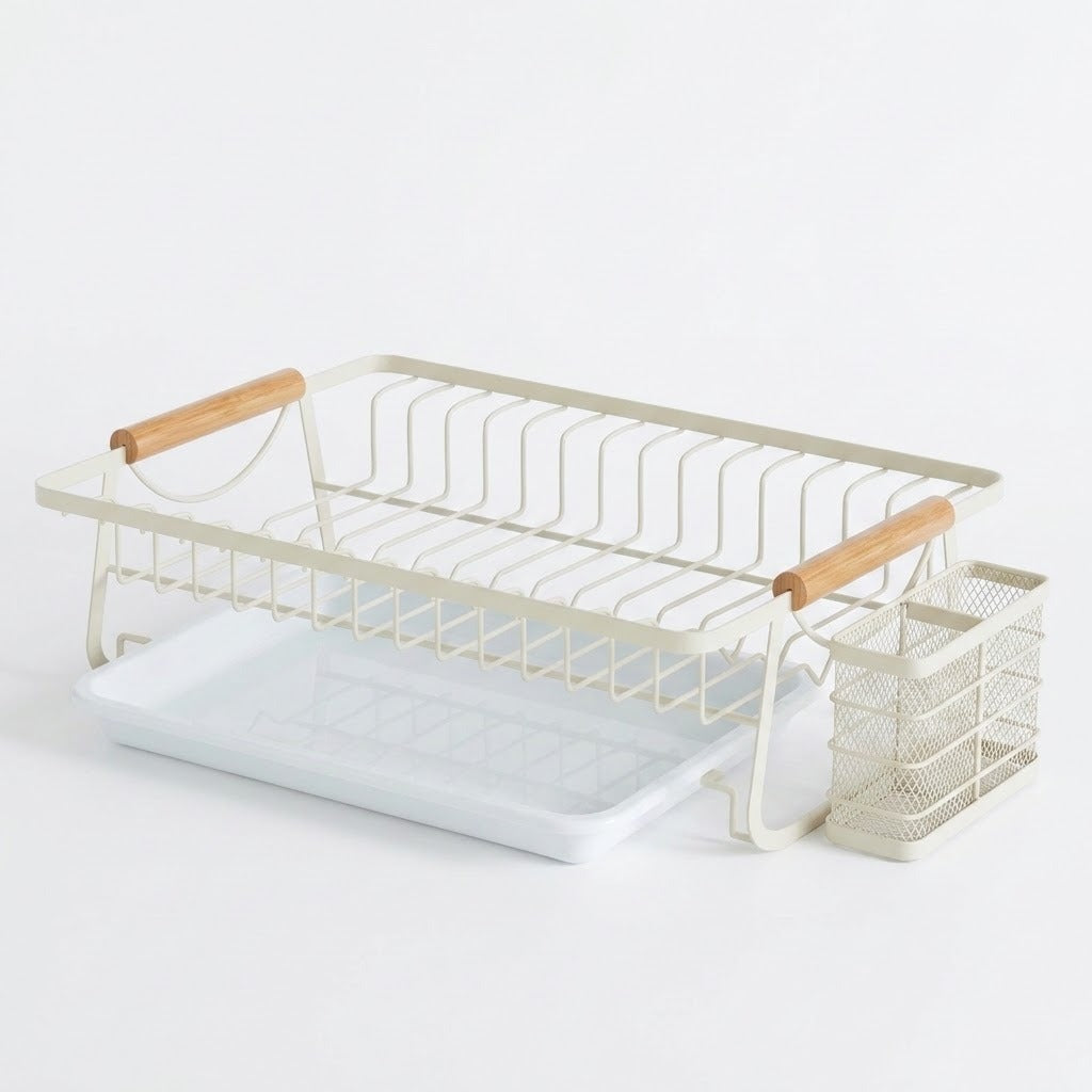 A white metal dish rack set with light wood handles, featuring a main wire drying rack, a matching mesh cup holder, and a white plastic tray on a seamless white background.