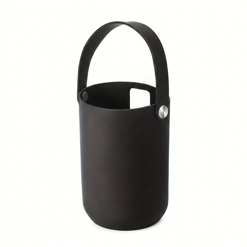 A matte black silicone wine bottle holder with a matching handle and a small silver metal rivet, shown on a plain white background.
