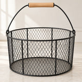 Black Wire Basket with Wood Handle highlights its open mesh and comfortable wood grip.