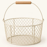 Beige Wire Basket with Wood Handle shown empty against a soft cream studio background.