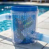 A pool skimmer basket with a blue top rim and clear plastic body, shown outdoors beside a swimming pool with water flowing through the side tubes.