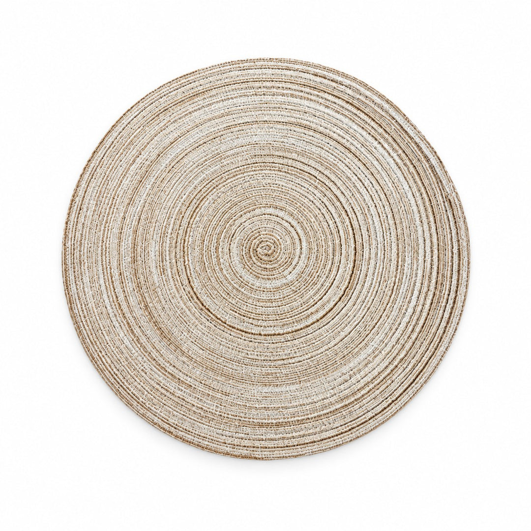 One light beige Round Woven Table Mat lies flat alone on a white background.