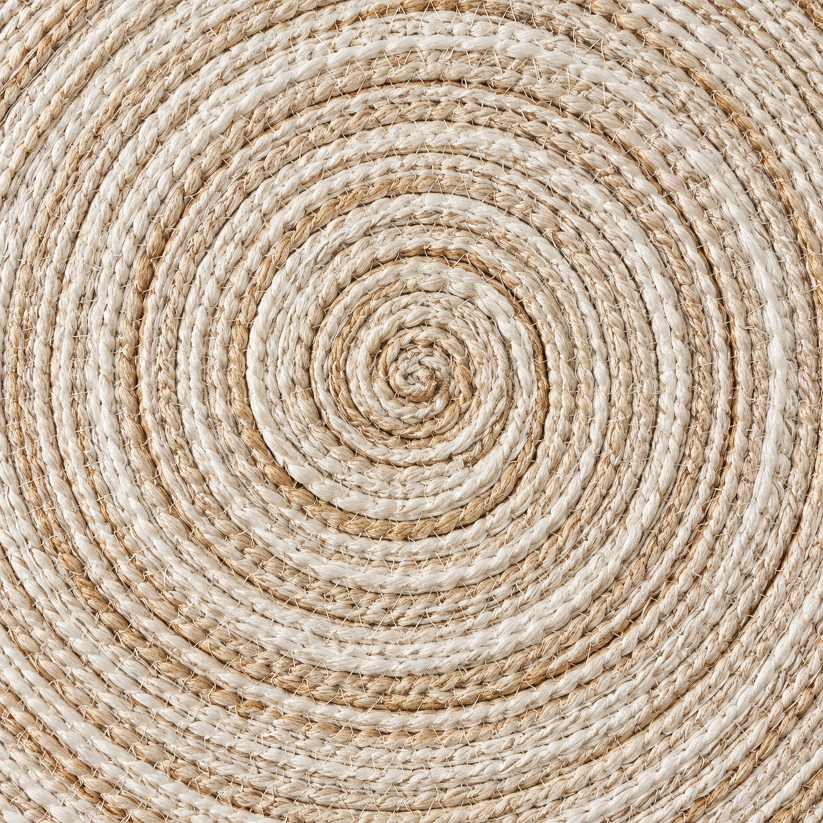 Close view of the light beige Round Woven Table Mat's textured concentric yarn weave.