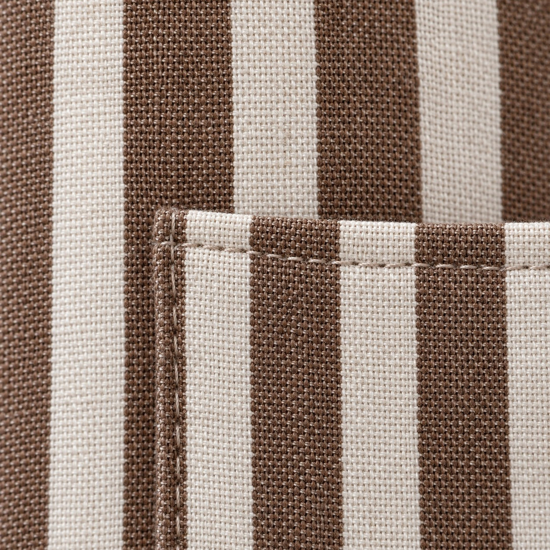 Close-up of the brown striped apron showing its woven linen-polyester texture and stitched pocket edge.