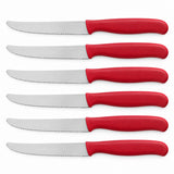 Six red Serrated Steak Knives are arranged together on a pure white background.