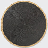 A round woven mat with a dark charcoal gray center and a natural tan braided border, shown from a top-down view on a light gray background.
