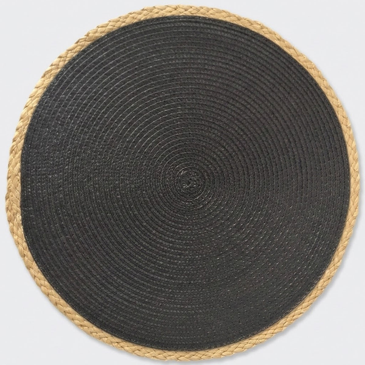 A round woven mat with a dark charcoal gray center and a natural tan braided border, shown from a top-down view on a light gray background.