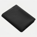 A folded black fabric sheet or pillowcase on a light gray background.