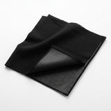 A folded black fabric accessory, likely a pocket square or scarf, displayed on a clean white background.