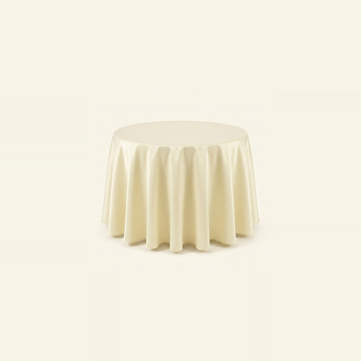 A round tablecloth in a light cream or ivory color, draped elegantly over a circular table against a solid, very light warm background.