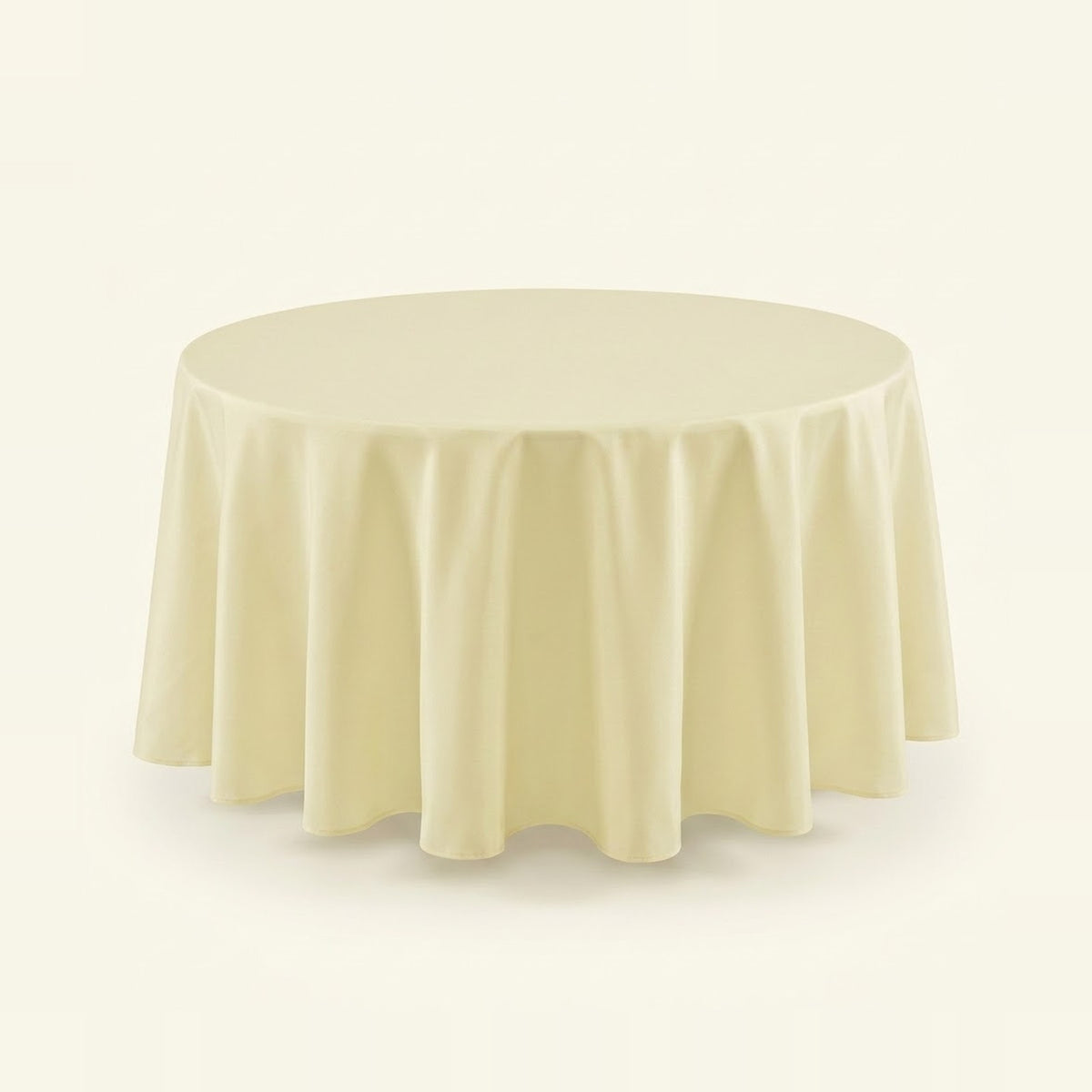 A round tablecloth in a soft cream or ivory color, draped elegantly over a circular table against a solid, light off-white background.