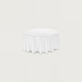 A white round tablecloth with a gathered skirt, shown centered against a solid light gray background.