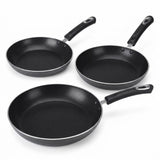 Three black non-stick frying pans of different sizes arranged on a white background.