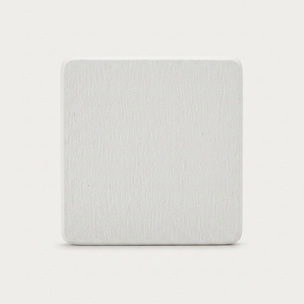 A square, light gray textured tile or coaster with rounded corners, centered on a clean white background.