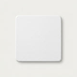 A square white coaster with rounded corners, shown from a top-down view on a light beige background.