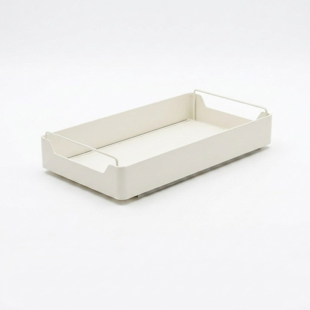A minimalist rectangular storage tray in a warm off-white/cream color, featuring a flat base and integrated wire side handles, shown on a seamless light gray background.