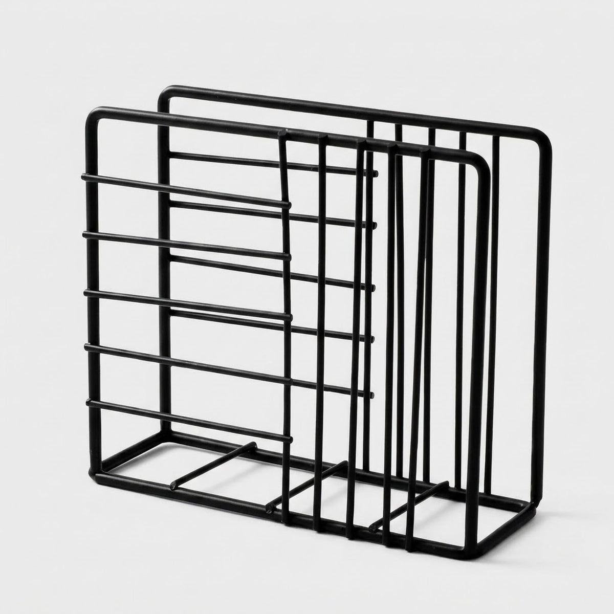 A black metal wire organizer rack with multiple vertical and horizontal bars, shown on a light gray background.