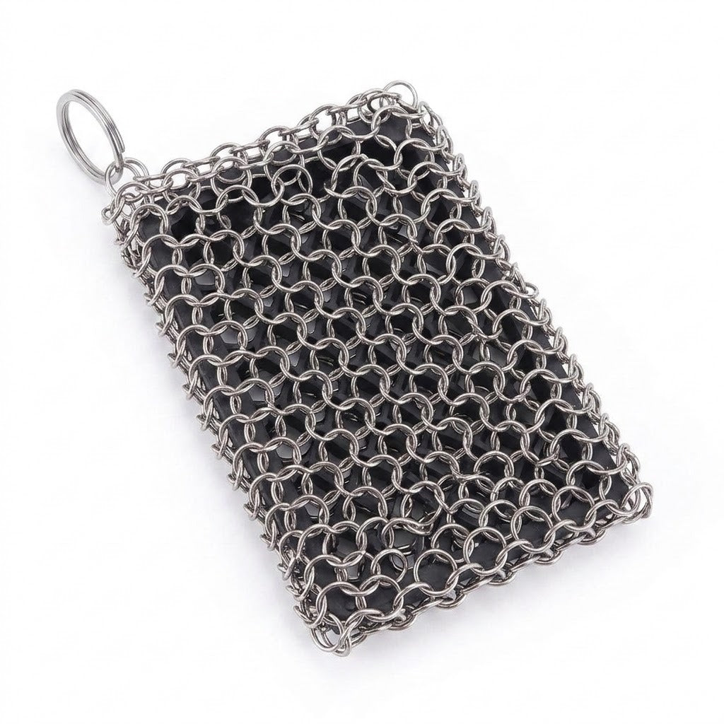 A rectangular silver chainmail or chainmail-style mesh pouch with a small metal ring attachment, photographed on a plain white background.