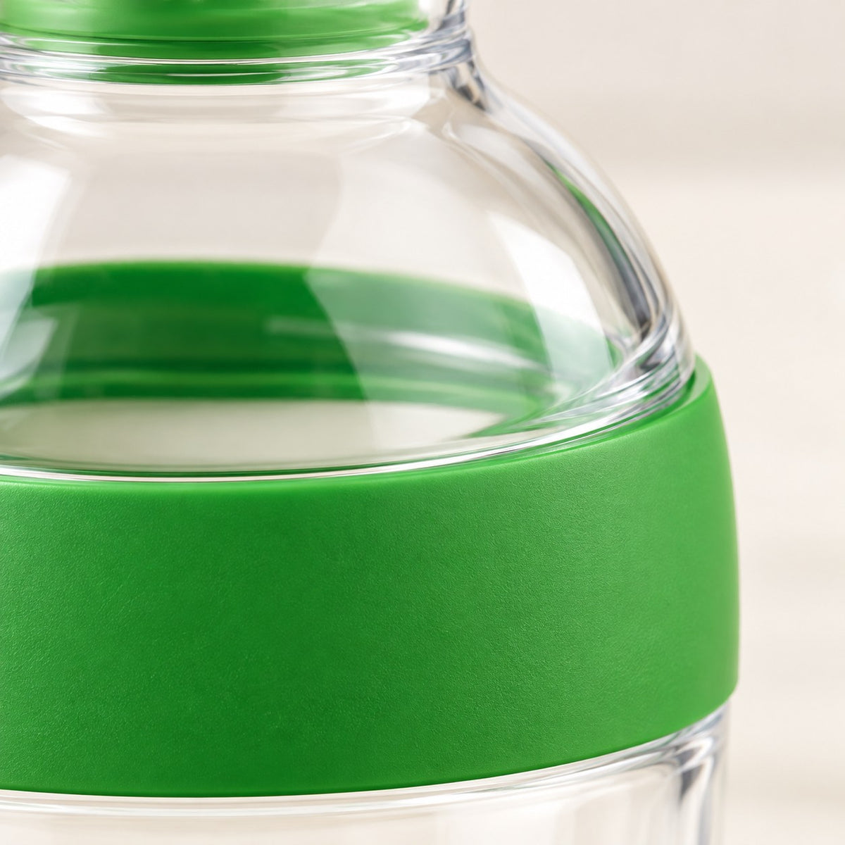 Close detail shows the Salad Dressing Shaker’s smooth green band and clear plastic finish.