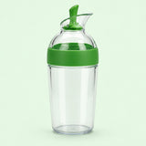 Green 240 ml Salad Dressing Shaker stands centered against a soft mint studio background.