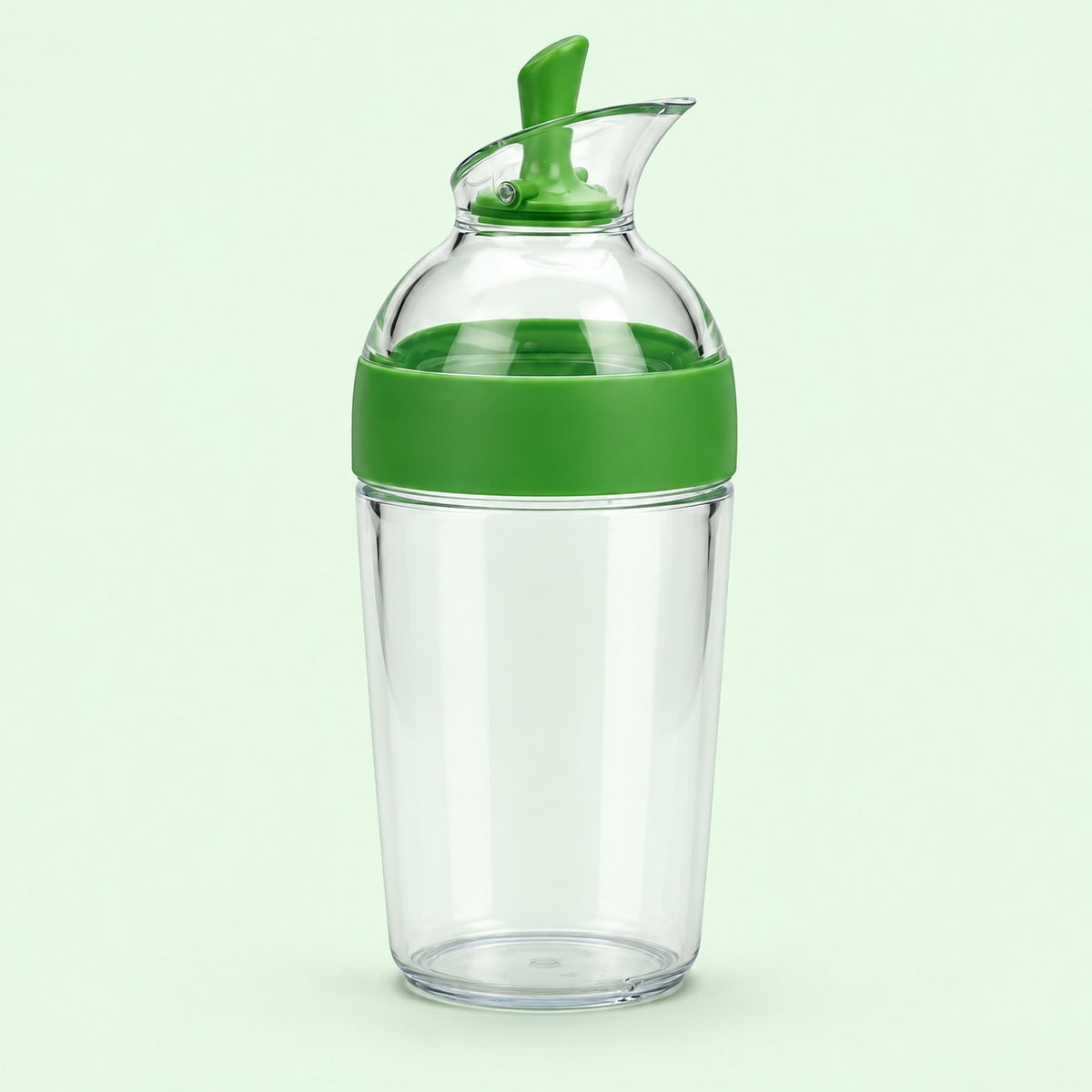 Green 240 ml Salad Dressing Shaker stands centered against a soft mint studio background.