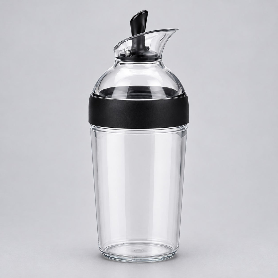 Black 240 ml Salad Dressing Shaker stands centered against a light gray studio background.