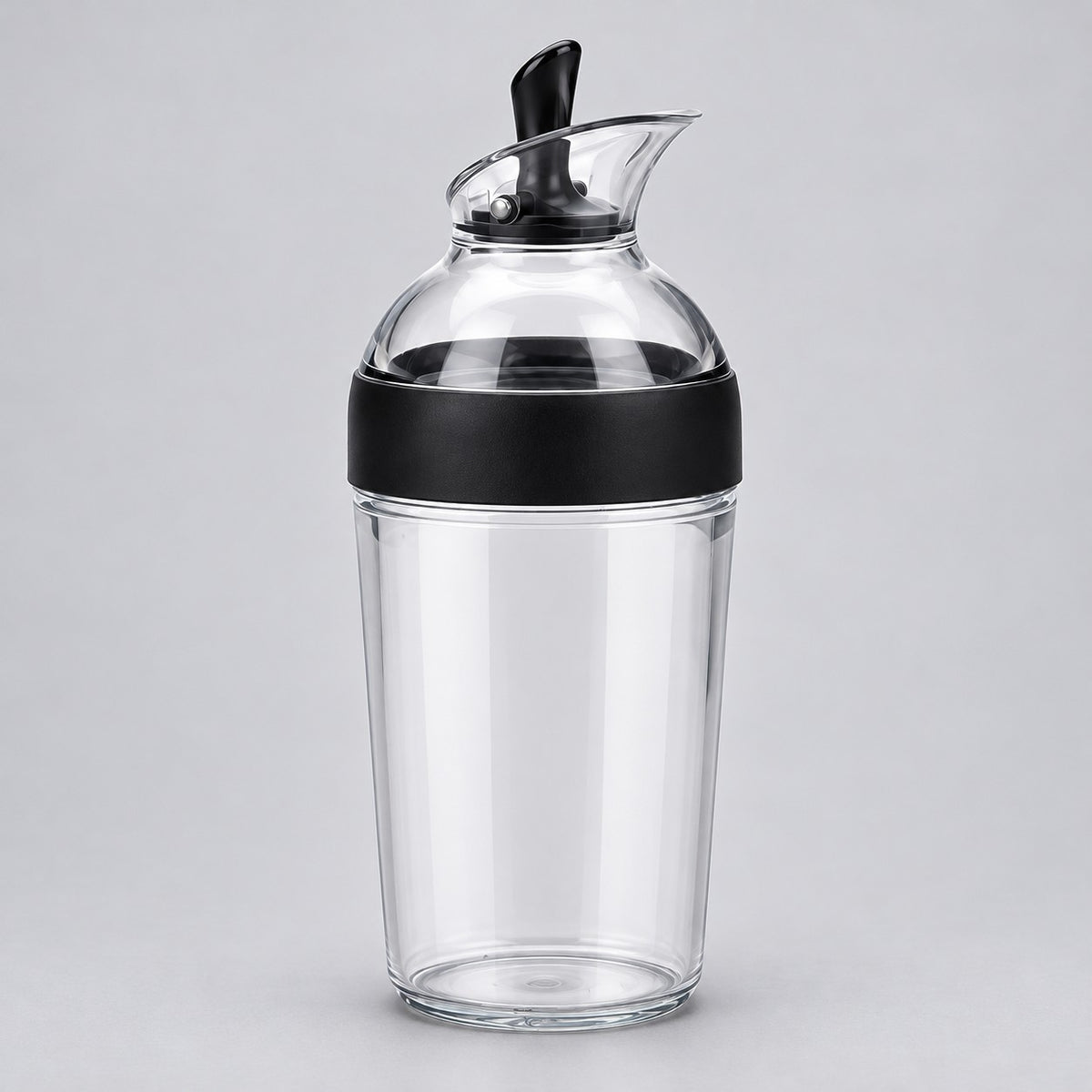 Black 240 ml Salad Dressing Shaker stands centered against a light gray studio background.
