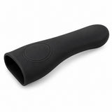 One black silicone pot handle cover sits alone on a white studio background.