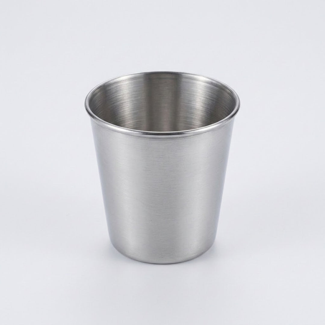A brushed stainless steel cup with a tapered cylindrical shape, shown on a clean light gray background.