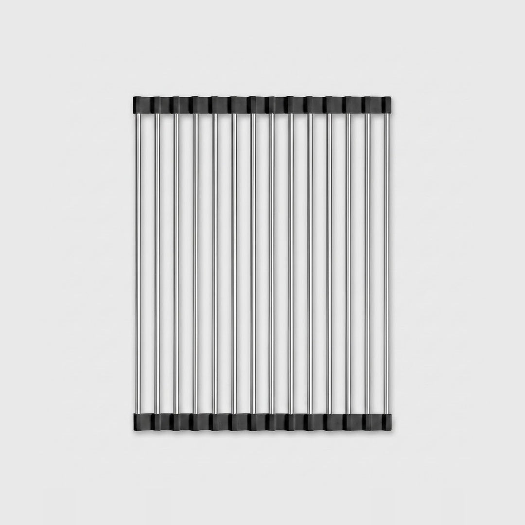 A rectangular metal wire rack or shelf with vertical bars and black end caps, shown centered on a light gray background.