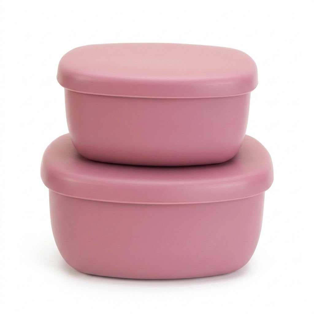 Two stacked round plastic storage containers with matching lids in a dusty rose pink color, shown on a clean white background.