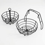 Two black metal wire basket holders with loop handles, shown on a clean white background.
