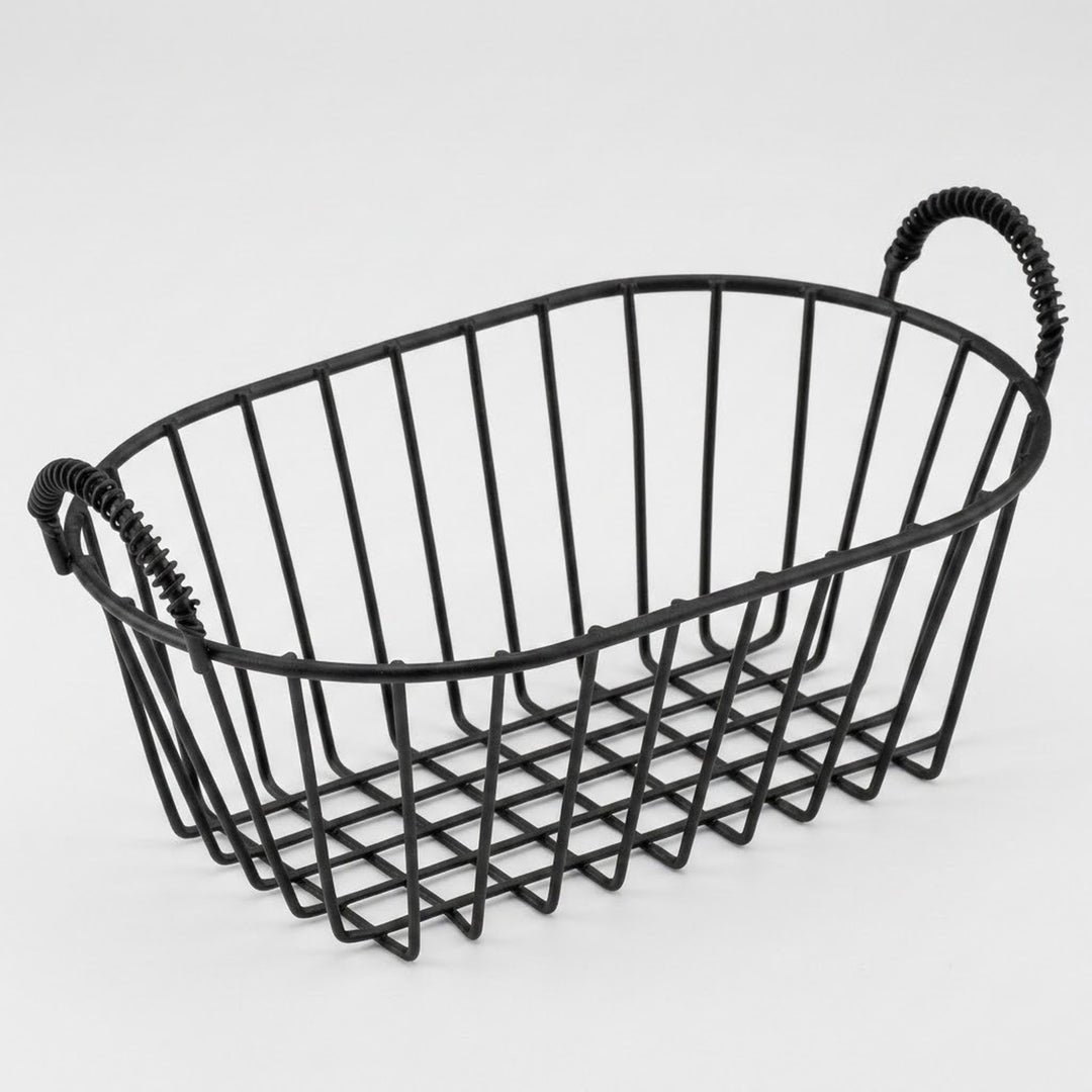 A black metal wire basket with two spiral-style handles, shown on a clean light gray background.