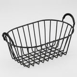A black metal wire basket with two spiral-style handles, shown on a clean light gray background.